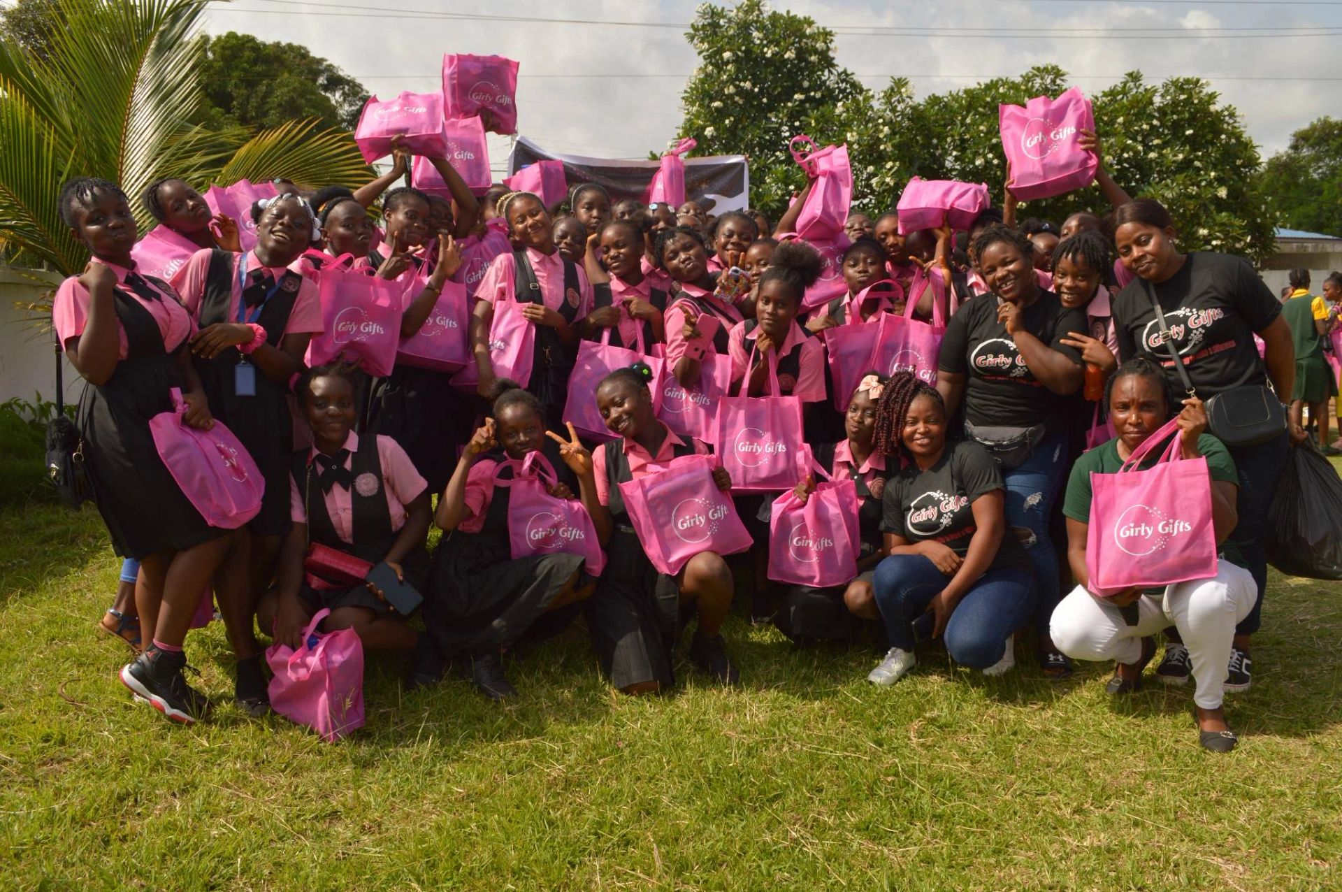 Girls in Liberia celebrating with Girly Gifts hygiene kits